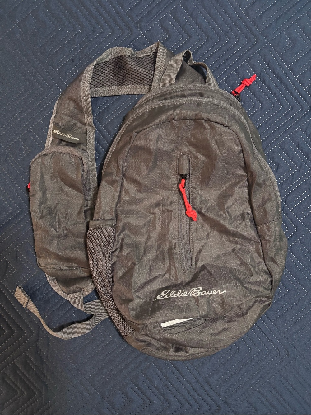 Eddie Bauer Grey Sling Pack with Red Accent Pulls